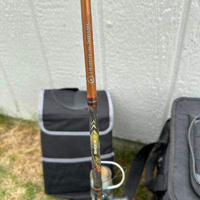 FISHING POLES WITH REELS, SOFT SIDED TITAN COOLER AND AN AUTO TRASH BIN