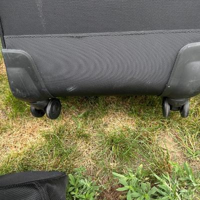 SUITCASES WITH 4 AND 2 WHEELS PLUS A CARRY ON BAG