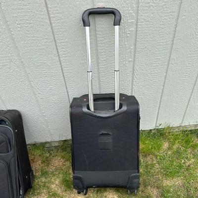 SUITCASES WITH 4 AND 2 WHEELS PLUS A CARRY ON BAG