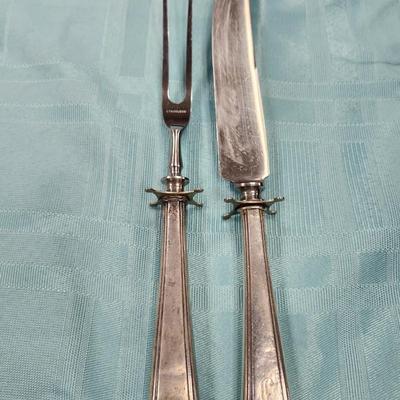 Sale Photo Thumbnail #102: This set is in very nice condition.  It includes:
8 knives
1 cake server
2 serving spoons
8 dinner forks
2 large serving forks
9 butter knives
8 iced tea spoons
8 soup spoons
6 teaspoons
1 large meat knife with fork 
gravy ladle
1 sugar spoon
8 seafood fo
