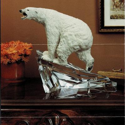 Sale Photo Thumbnail #103: Franklin Mint. The majestic polar bear dramatically portrayed in hand painted porcelain  poised on a pinnacle of sparkling full lead crystal.  
10.5 inches tall.  Very heavy.  local pickup only.  Retails at $150
