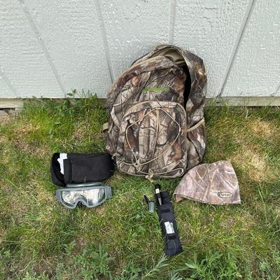CAMO BACKPACK, LASER LIGHT, CAMO KNIT HAT AND SAFETY GOGGLES