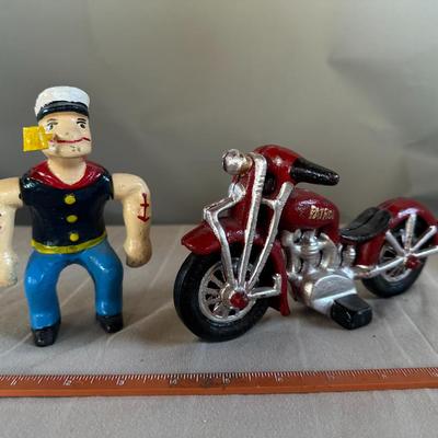Popeye the Sailor Man on Red Motorcycle (Wheels & Arms Move) Cast Iron Toy