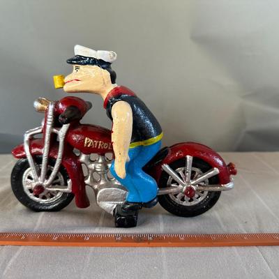 Popeye the Sailor Man on Red Motorcycle (Wheels & Arms Move) Cast Iron Toy