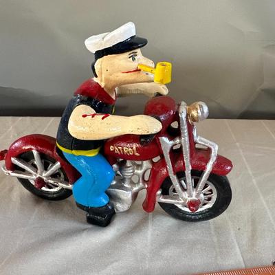 Popeye the Sailor Man on Red Motorcycle (Wheels & Arms Move) Cast Iron Toy