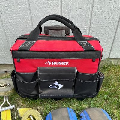 HUSKY TOOL BAG ON WHEELS W/HANDLE, RATCHET STRAPS AND KNEE PADS
