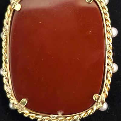 Sale Photo Thumbnail #108: Cameos are rarely found with a young boy.  Seed pearls are embedded 
in the 10K gold setting, Victorian era.  Retails at $200 to $400