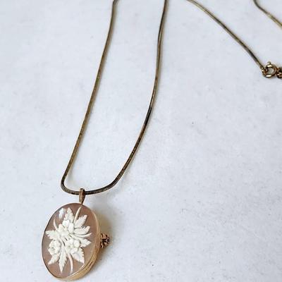 Sale Photo Thumbnail #117: Set in 14K gold stamped setting
925   20 inch chain 
Retails at $200