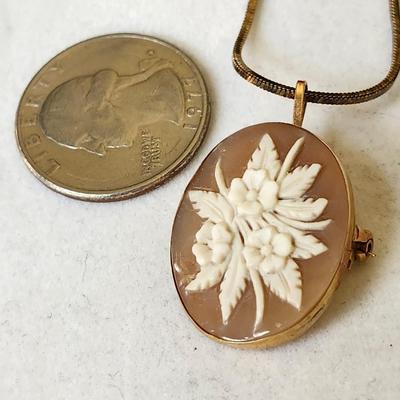 Sale Photo Thumbnail #114: Set in 14K gold stamped setting
925   20 inch chain 
Retails at $200
