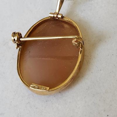 Sale Photo Thumbnail #115: Set in 14K gold stamped setting
925   20 inch chain 
Retails at $200