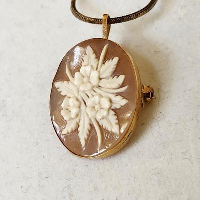 Sale Photo Thumbnail #116: Set in 14K gold stamped setting
925   20 inch chain 
Retails at $200