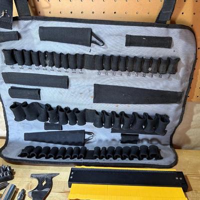 HAND TOOLS AND A SOCKET HOLDER