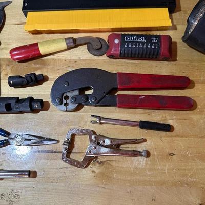 HAND TOOLS AND A SOCKET HOLDER