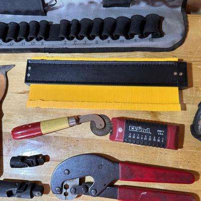 HAND TOOLS AND A SOCKET HOLDER
