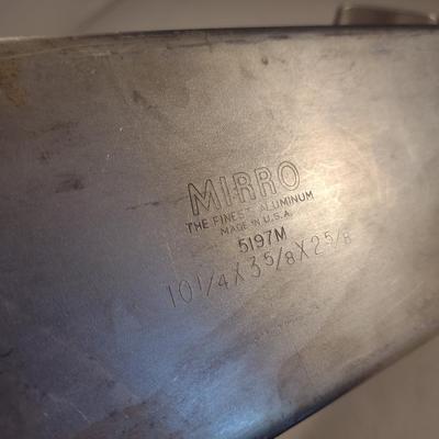 Collection of Metal Molds with Covered Refrigerator Container