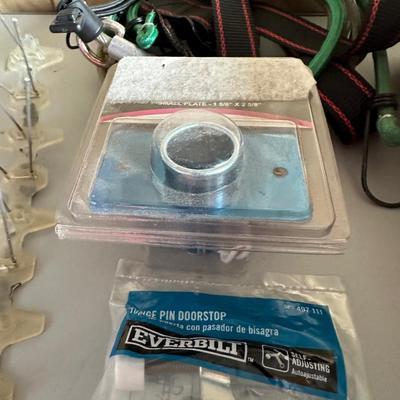 HARDWARE, BUNGEE CORDS, STRAPS, CELLOPHANE STRETCH WRAP, T-SHAPED RULER AND MORE