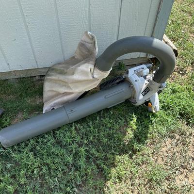 RYOBI GAS BLOWER/VACUUM AND RYOBI CORDLESS WEED CUTTER WITH CHARGER AND 2 BATTERIES