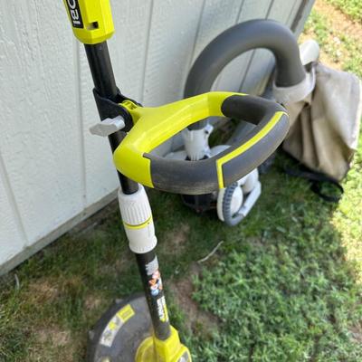 RYOBI GAS BLOWER/VACUUM AND RYOBI CORDLESS WEED CUTTER WITH CHARGER AND 2 BATTERIES