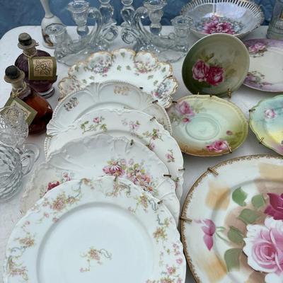 Variety of vintage plates and glassware