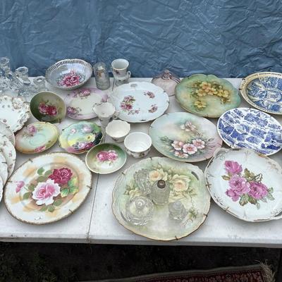 Variety of vintage plates and glassware