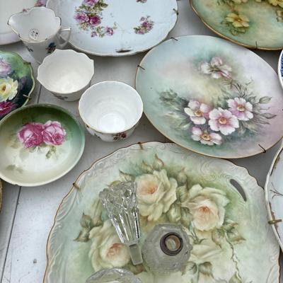 Variety of vintage plates and glassware