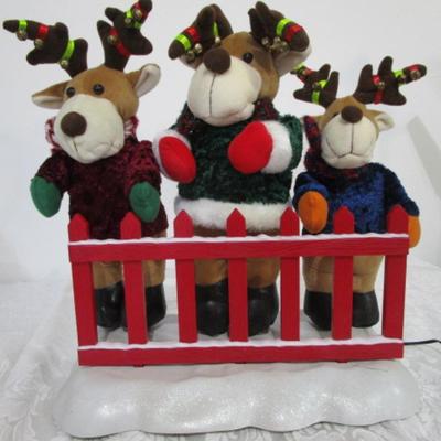 3 electric musical moving reindeer on base