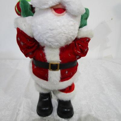 Musical snowman-cheeks light up, Santa figure