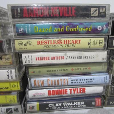 24 cassette tapes, various titles