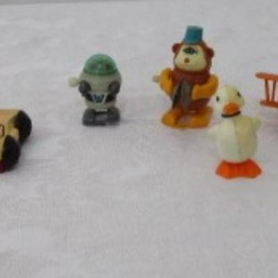 Vintage mini toys, 7 wind up, 2 are transformers