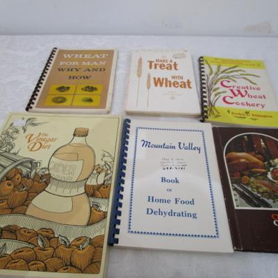 3 cooking with wheat books, 1 dehydrating book, 2 cookbooks