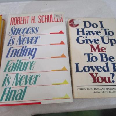 4 positivity books, 1 poetry book, 1 Ideals book, 1 book on John F. Kennedy