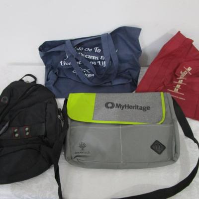 1 messenger bag, 1 over shoulder backpack/purse, 2 shopping bags