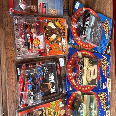 Cars, miniature pencil sharpeners, crosses, and more