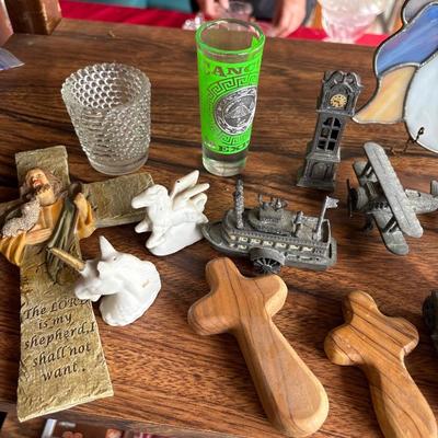 Cars, miniature pencil sharpeners, crosses, and more
