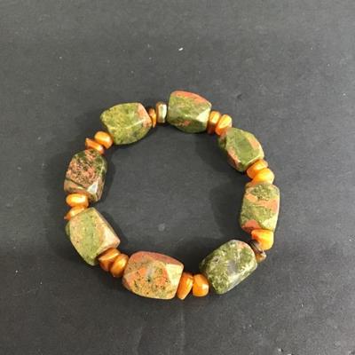 Sale Photo Thumbnail #10: Very nice polished Earthstone stretchy bracelet. Please see attached photos.