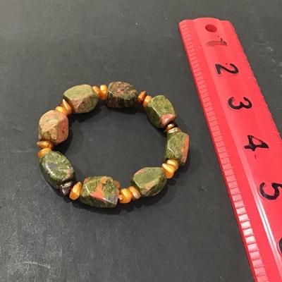 Sale Photo Thumbnail #9: Very nice polished Earthstone stretchy bracelet. Please see attached photos.