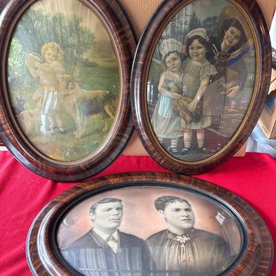 Three vintage oval bubble glass pictures