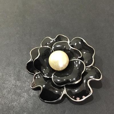Sale Photo Thumbnail #115: Silvertone black enamel brooch. Please see attached photos.