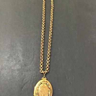 Sale Photo Thumbnail #145: Vintage gold tone chain and locket . 
Please attach photos.