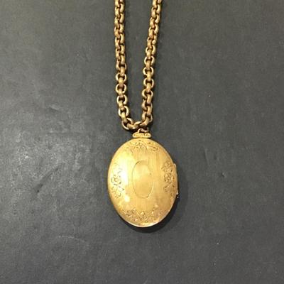 Sale Photo Thumbnail #146: Vintage gold tone chain and locket . 
Please attach photos.