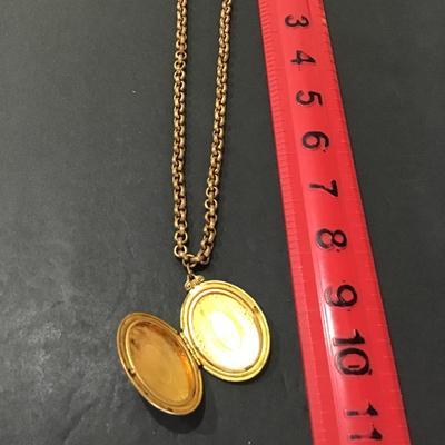 Sale Photo Thumbnail #147: Vintage gold tone chain and locket . 
Please attach photos.