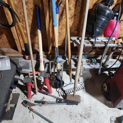 Lot of Garden Tools , Car Jacks , Garden Sprayers, Axe, Racks, Pick, Pitch Fork