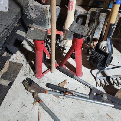 Lot of Garden Tools , Car Jacks , Garden Sprayers, Axe, Racks, Pick, Pitch Fork