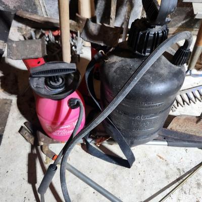 Lot of Garden Tools , Car Jacks , Garden Sprayers, Axe, Racks, Pick, Pitch Fork