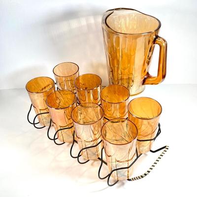 LOT 68: Carnival Glass Glasses with Metal Carrying Rack and Pitcher with Ice Lip