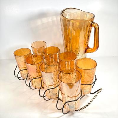 LOT 68: Carnival Glass Glasses with Metal Carrying Rack and Pitcher with Ice Lip