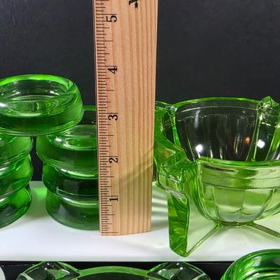 LOT 123: Vintage Uranium Items, 2 Large & 7 Small Furniture Sliders, Sunflower Ashtray, Art Deco Ashtray & 4 Small Fire King Dishes