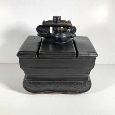 LOT 143: Vintage McCoy USA Black Stove Cookie Jar