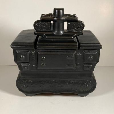 LOT 143: Vintage McCoy USA Black Stove Cookie Jar