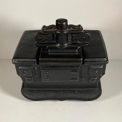 LOT 143: Vintage McCoy USA Black Stove Cookie Jar